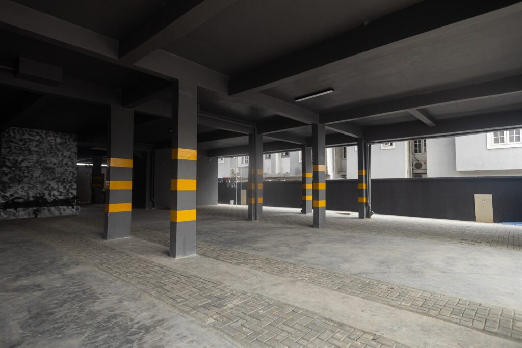Brum Height 8: Covered parking area with striped columns